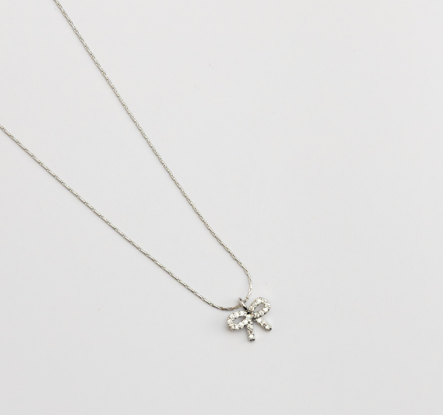 Dainty crystal bow necklace