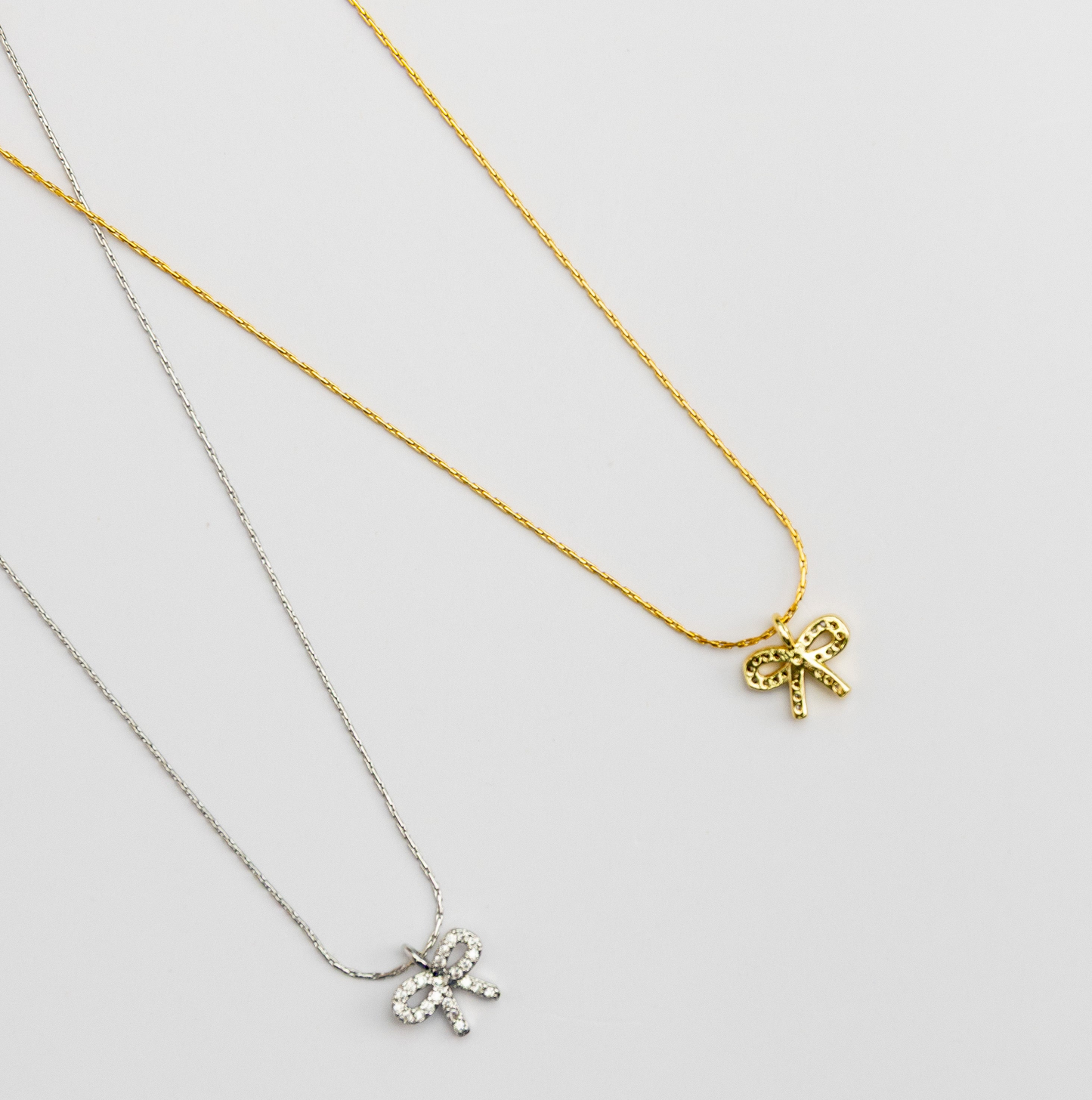 Dainty crystal bow necklace