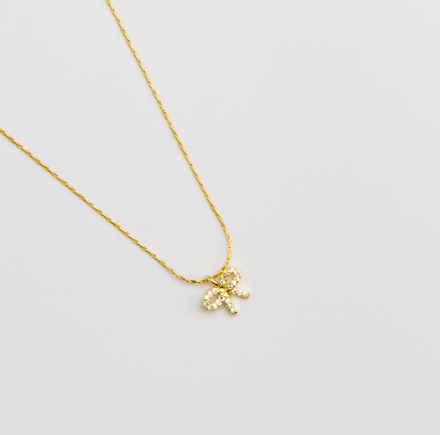 Dainty crystal bow necklace